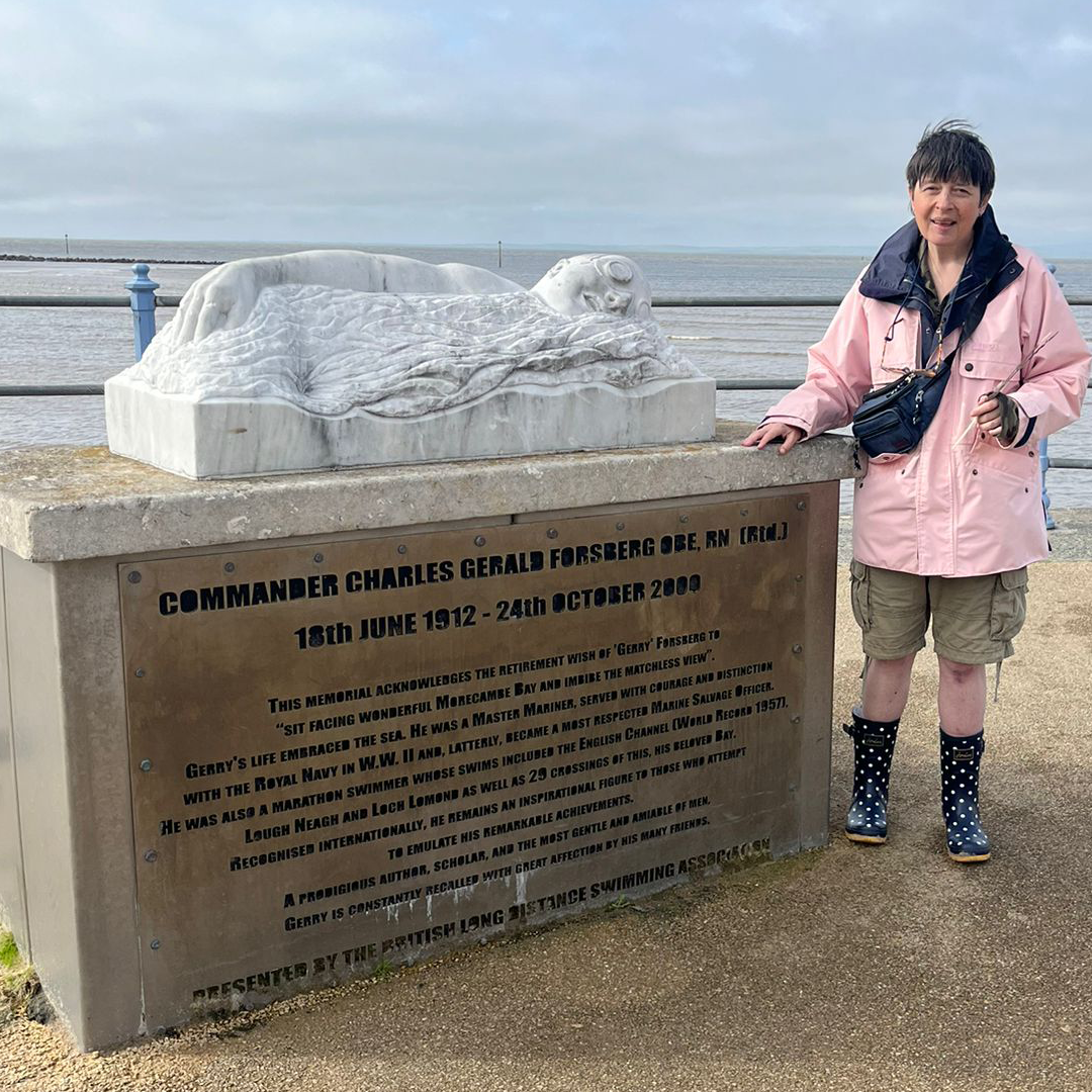 Sarah standing beside Ocean Edge Holiday Park